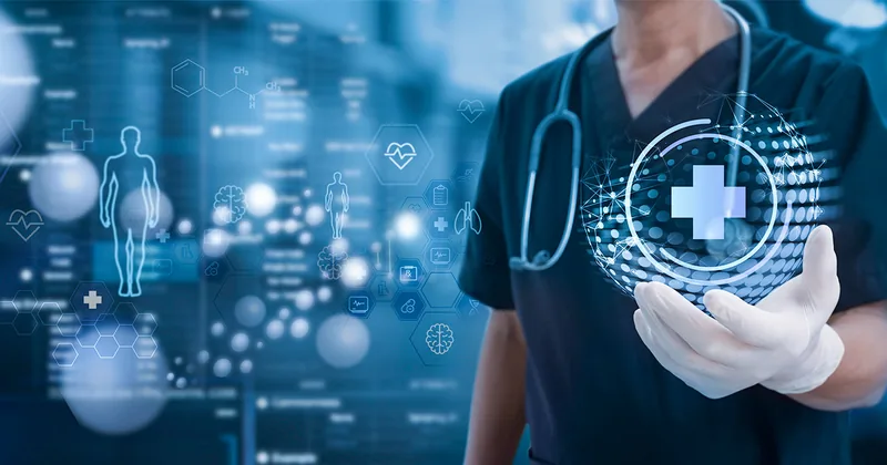 Clinician holding a digital medical cross over health data graphics