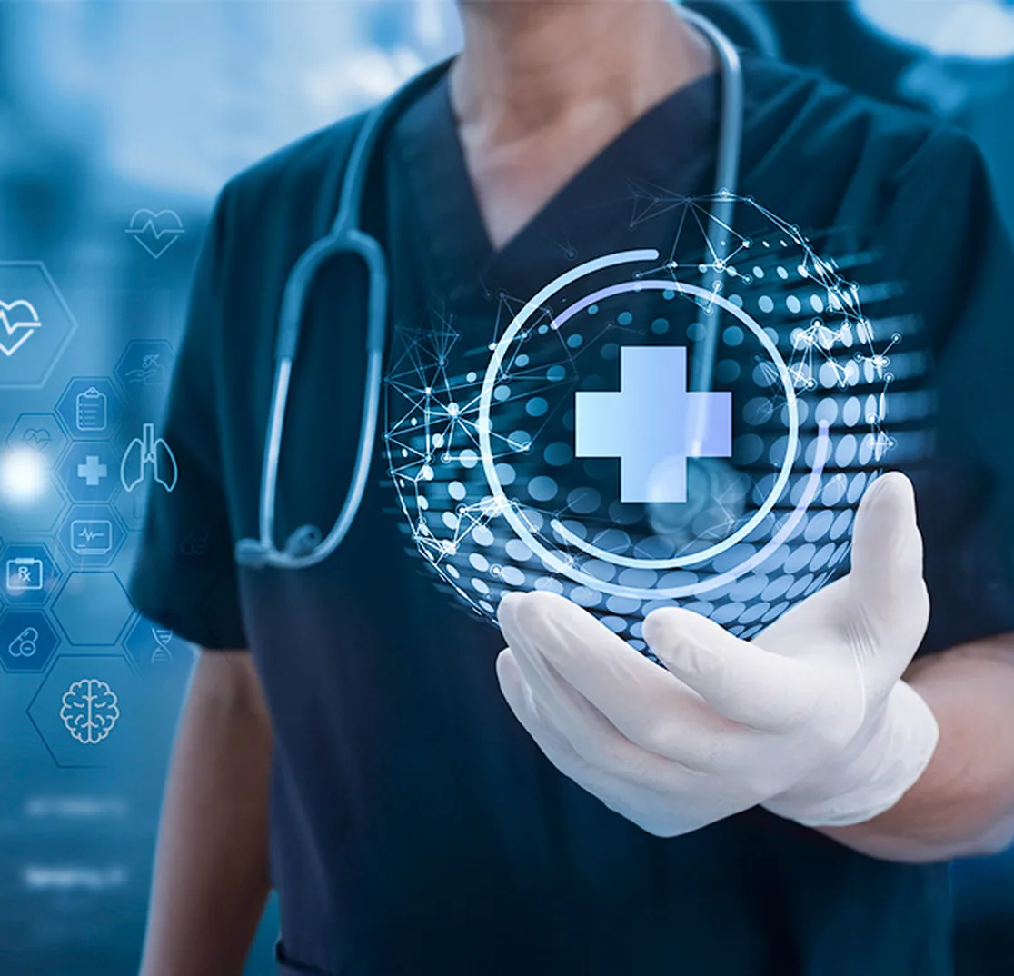 A doctor holding a glowing medical cross icon