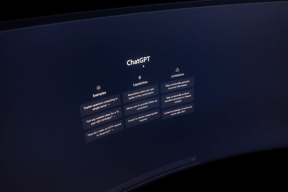 A screen showing an AI chat interface in a dark room
